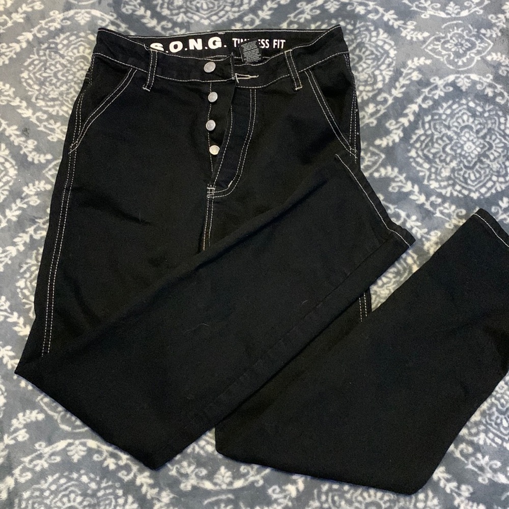 Black pants with white threading